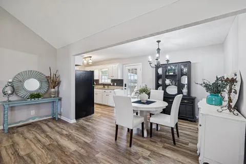 a view of a dining room with furniture