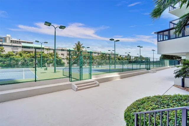 a view of a street with a park