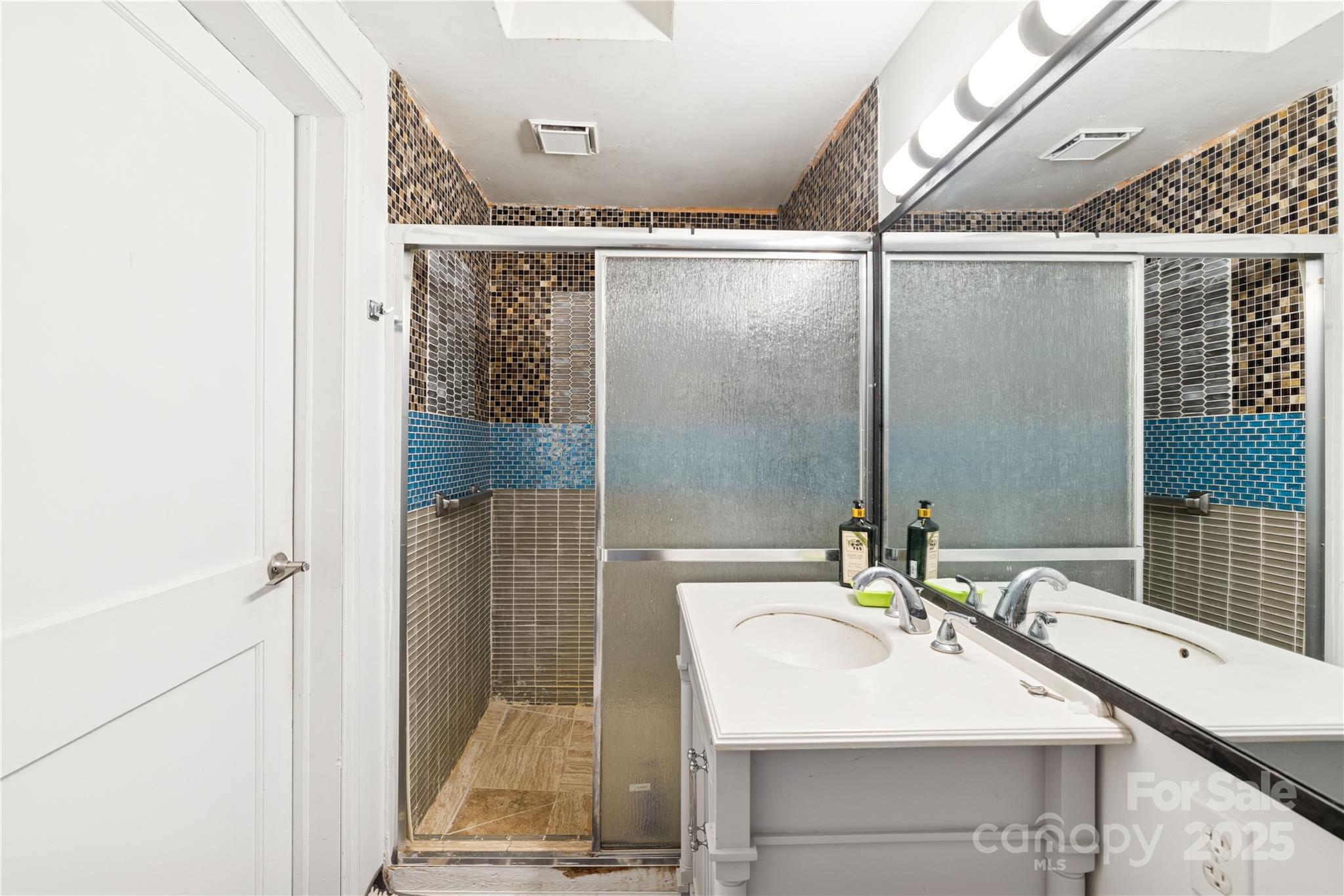 236 Little River Road Fort Mill, SC 29707 - Photo 12 of 22 a bathroom with a sink and a mirror
