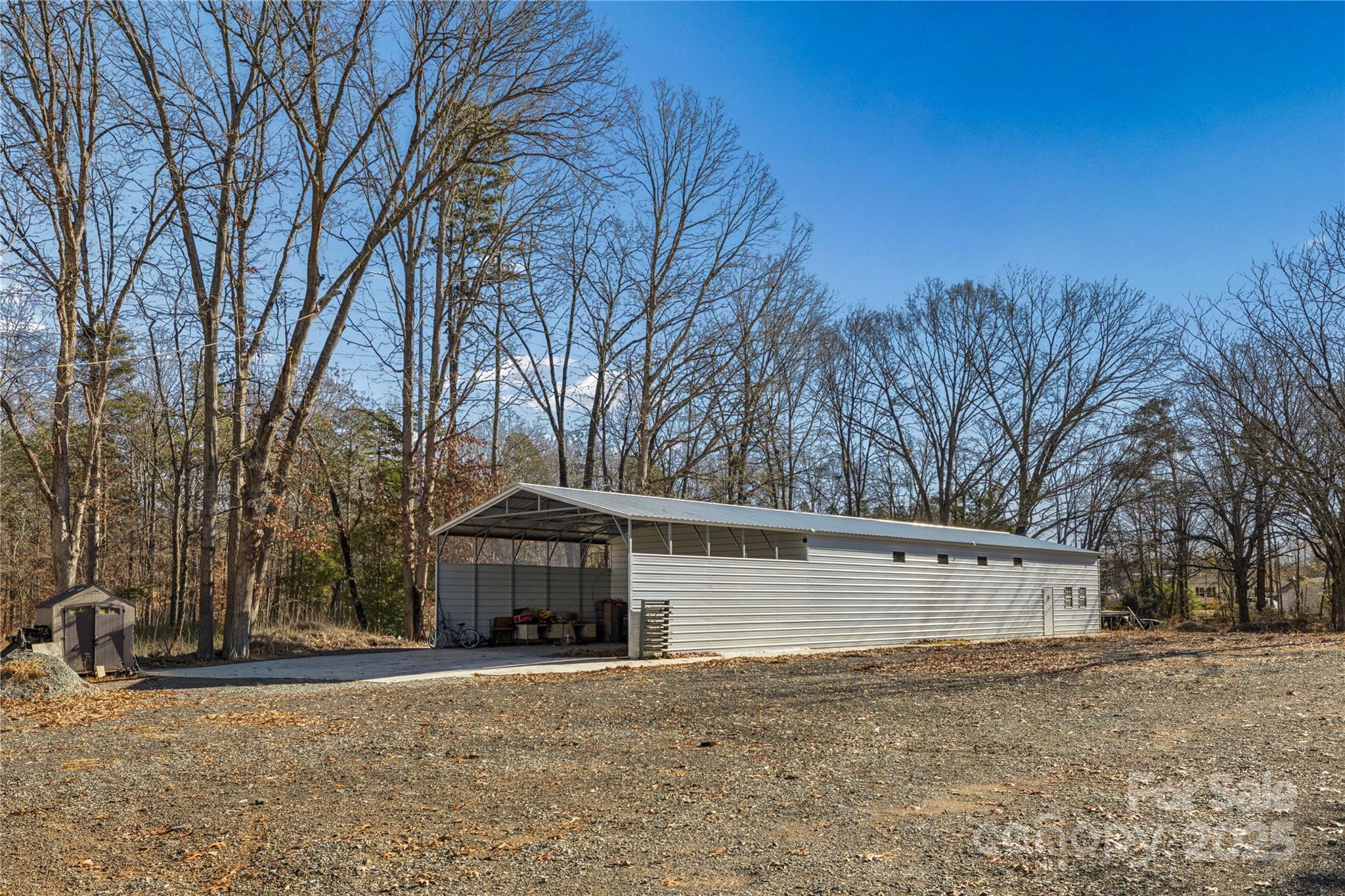 236 Little River Road Fort Mill, SC 29707 - Photo 8 of 22 a view of a house with snow on the road