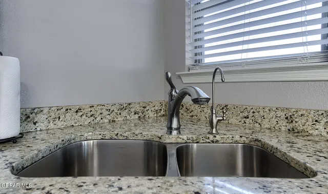 a view closed with a granite countertop sink