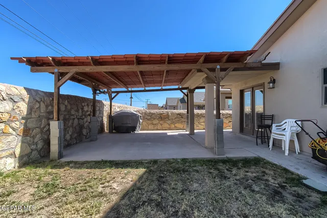a view of a backyard of a house