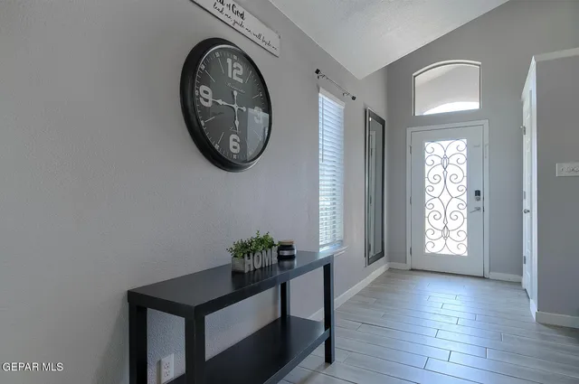 a view of a hallway with entryway