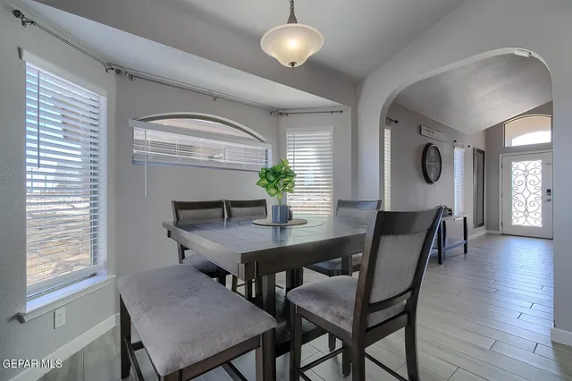 a view of a dining room with furniture
