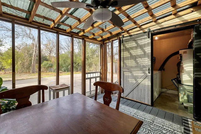 a view of a livingroom with furniture and staircase