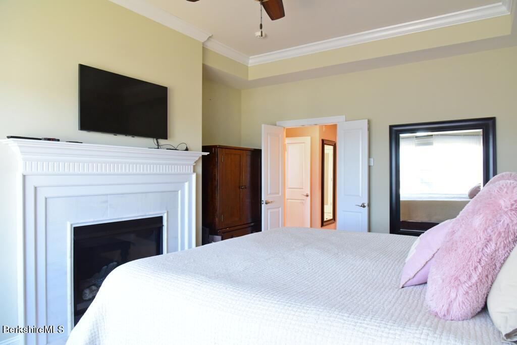 13 Burning Tree Road Great Barrington, MA 01230 - Photo 18 of 38 primary bedroom with fireplace