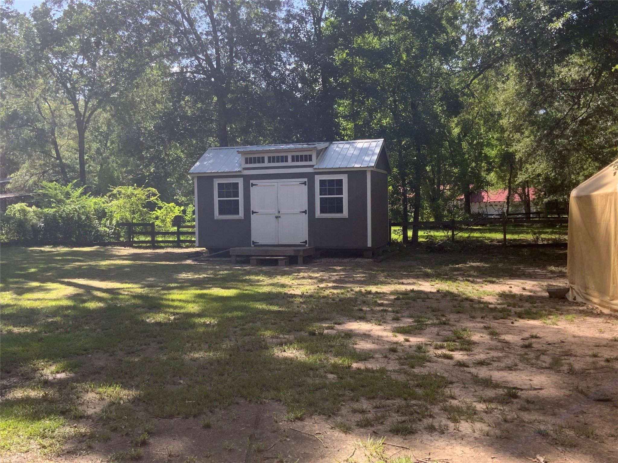 1114 Lake Glen Road Huffman, TX 77336 - Photo 3 of 22 a view of a house with a yard