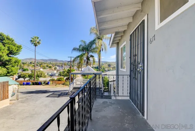 a view of a backyard and a patio