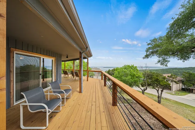 a view of balcony with chairs