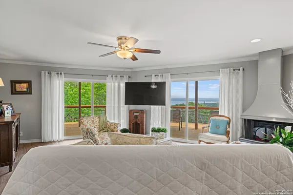 a bed room with a bed and a fireplace