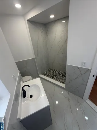 a bathroom with a sink and a tub