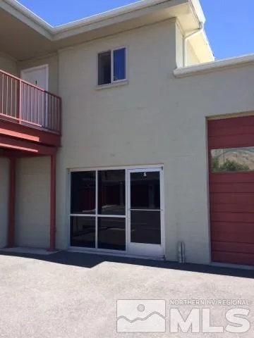 a view of an entrance of the house