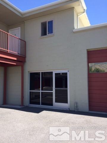 a view of an entrance of the house