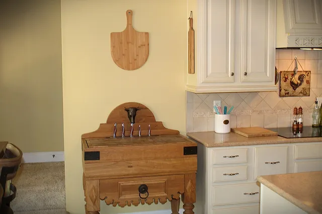 a kitchen with a sink and cabinets