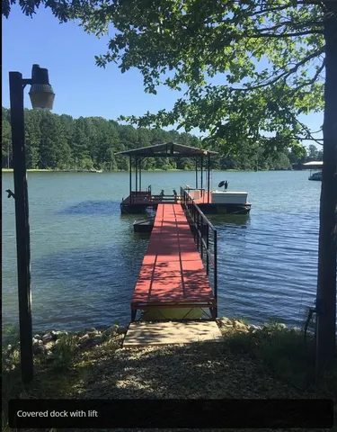 a view of a lake with a mountain in the background