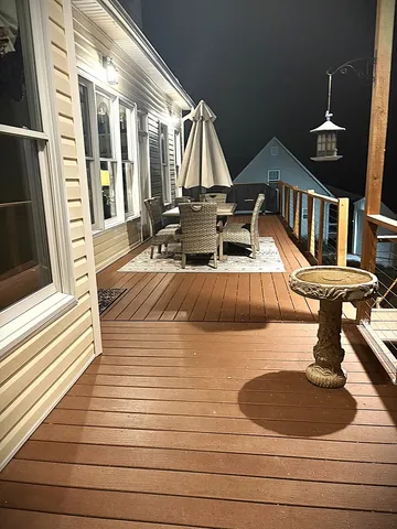 a view of a hall with wooden floor