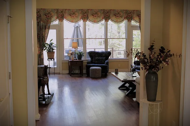 a living room with furniture and a window