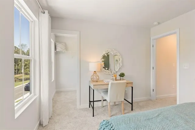 a bathroom with a glass shower door and a toilet