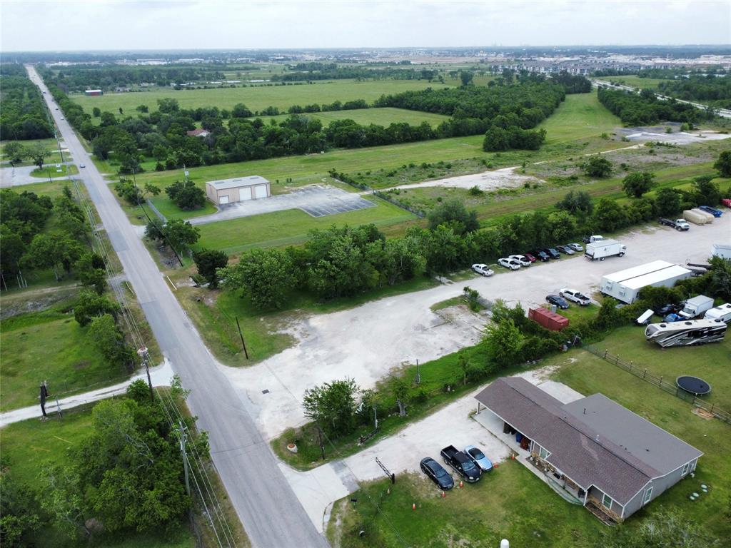 0 John Martin Road Baytown, TX 77521 - Photo 17 of 19 an aerial view of a house with garden space and mountain view in back