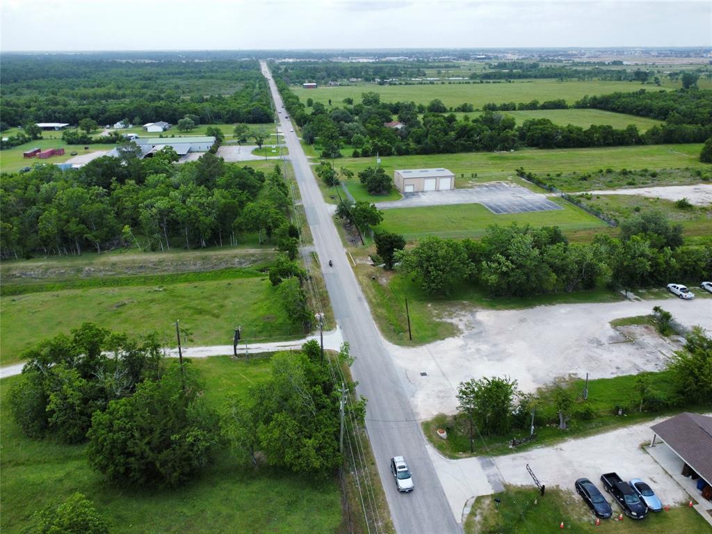0 John Martin Road Baytown, TX 77521 - Photo 19 of 19 an aerial view of residential houses with outdoor space and trees