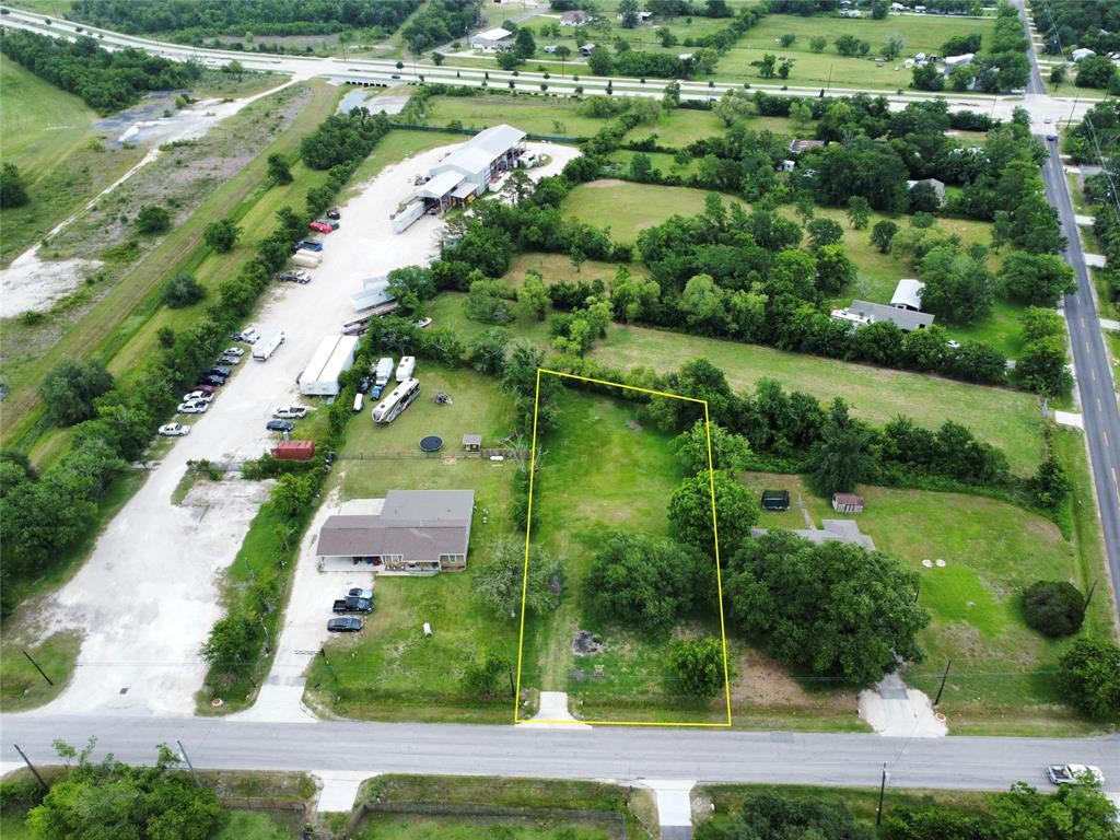 0 John Martin Road Baytown, TX 77521 - Photo 2 of 19 an aerial view of residential houses with outdoor space and street view