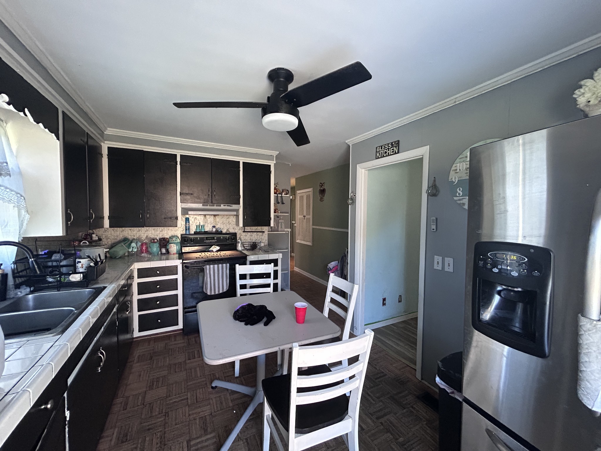 476 Sunset Drive Sparta, TN 38583 - Photo 4 of 21 a kitchen with a dining table and chairs