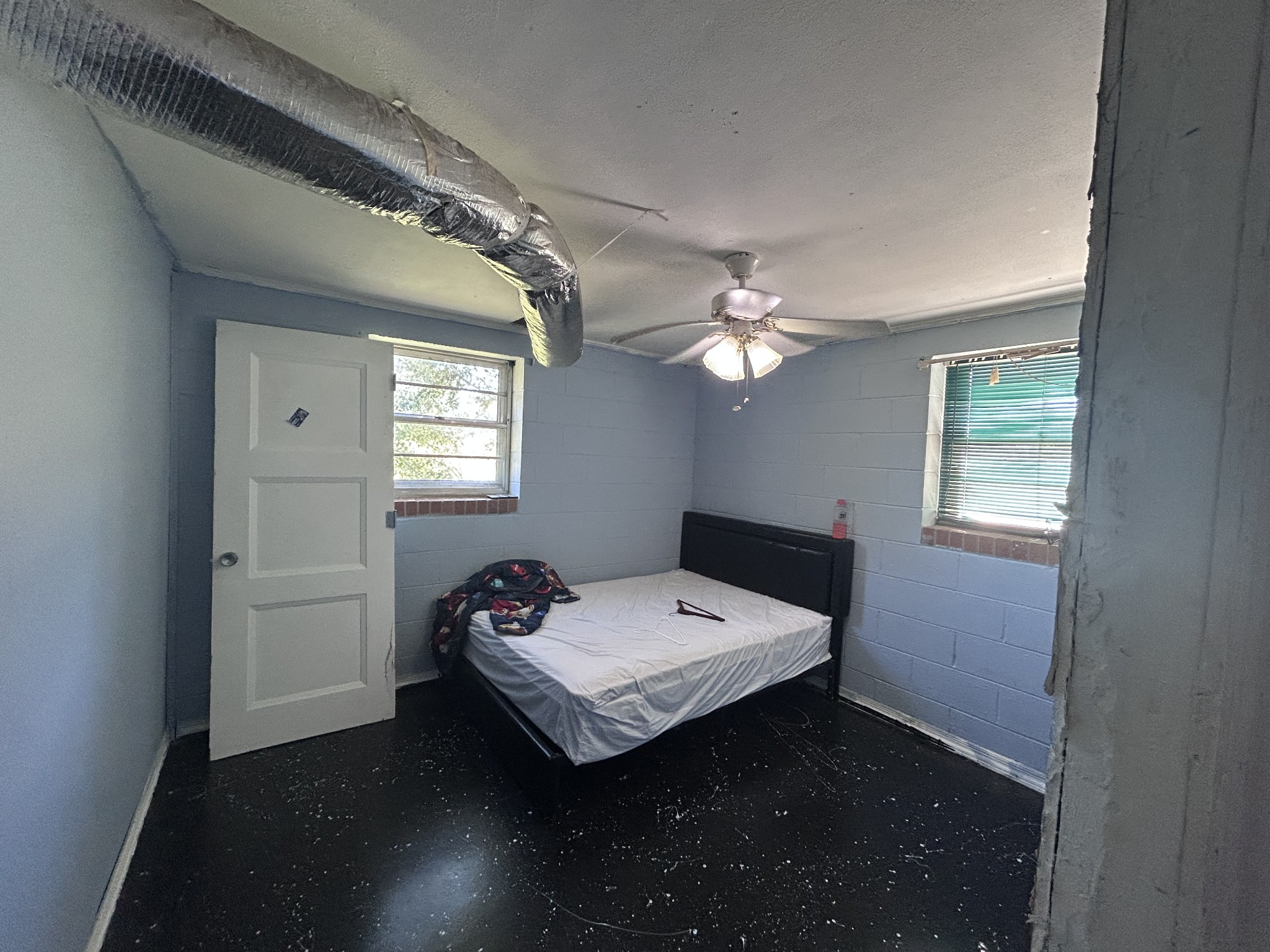 476 Sunset Drive Sparta, TN 38583 - Photo 10 of 21 a bed sitting in a bedroom next to a window