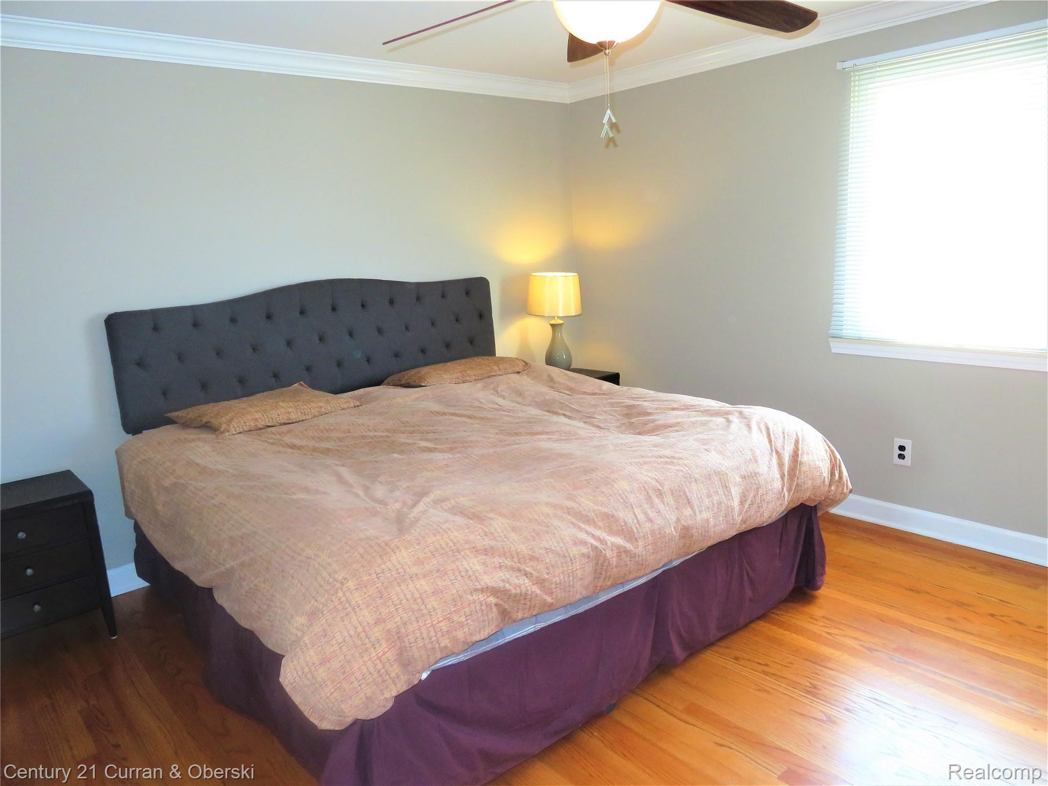 7770 Provincial Road Canton, MI 48187 - Photo 14 of 26 Master Bedroom with ceiling fan and hardwood floor