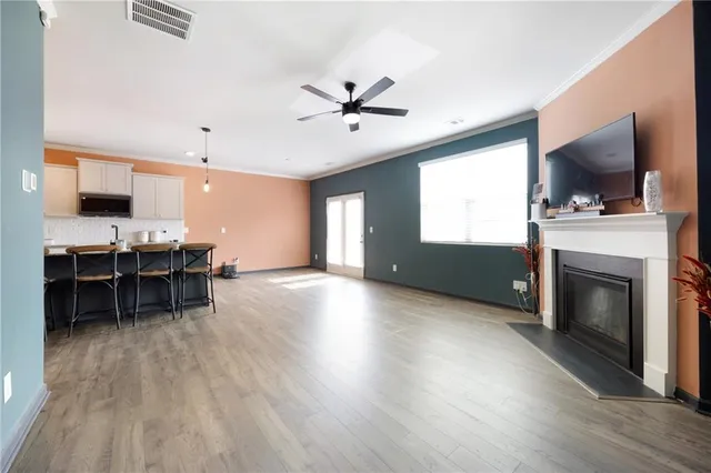 a view of a livingroom with furniture and a fireplace