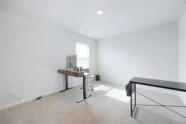 a room with a table and a window