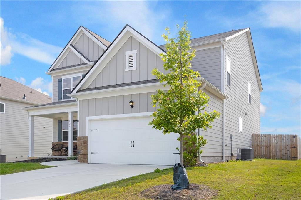 7571 Deerridge Way Fairburn, GA 30213 - Photo 3 of 26 a house view with a outdoor space