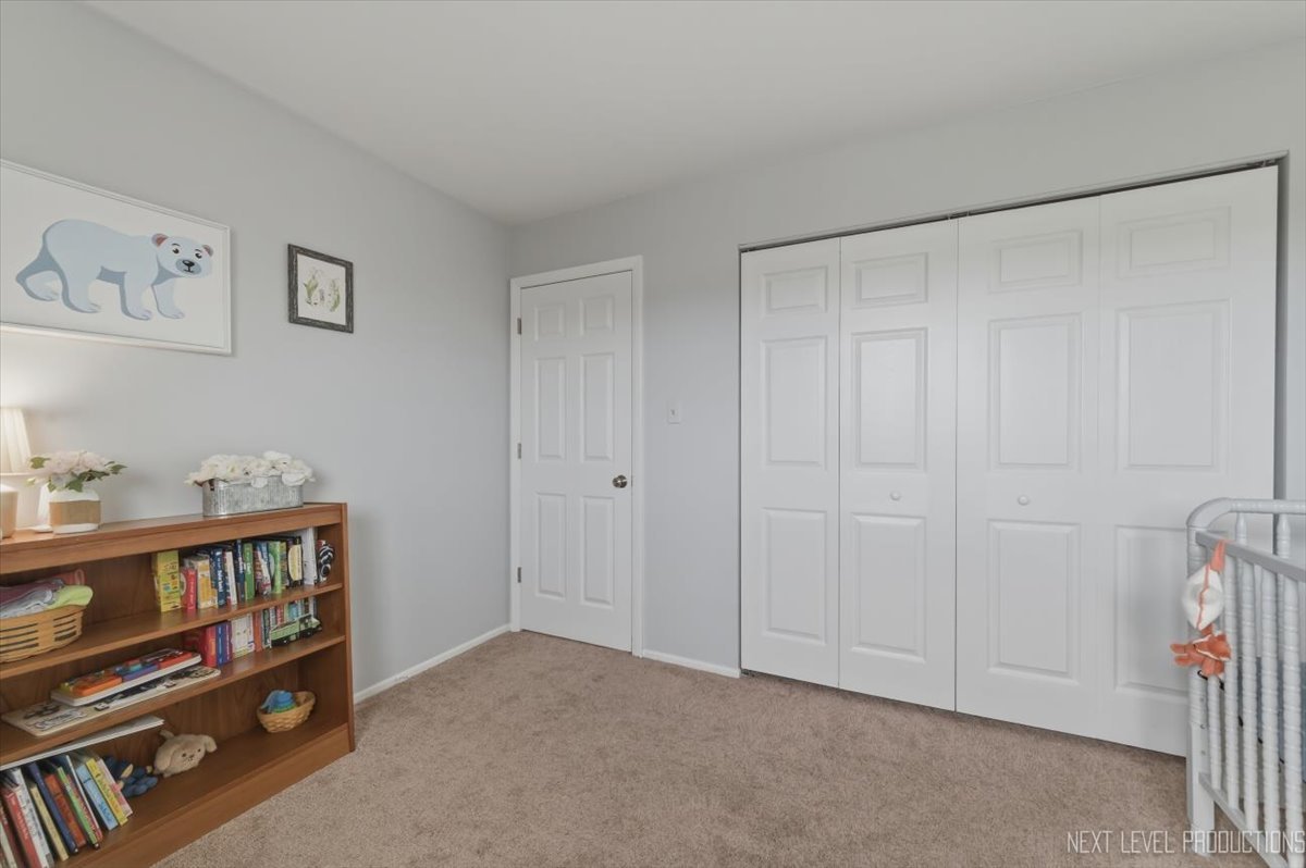 1601 Castbourne Court Wheaton, IL 60189 - Photo 19 of 30 a view of an empty room with a window