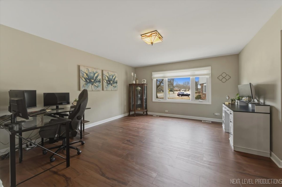 1601 Castbourne Court Wheaton, IL 60189 - Photo 9 of 30 a view of a workspace with furniture and a window