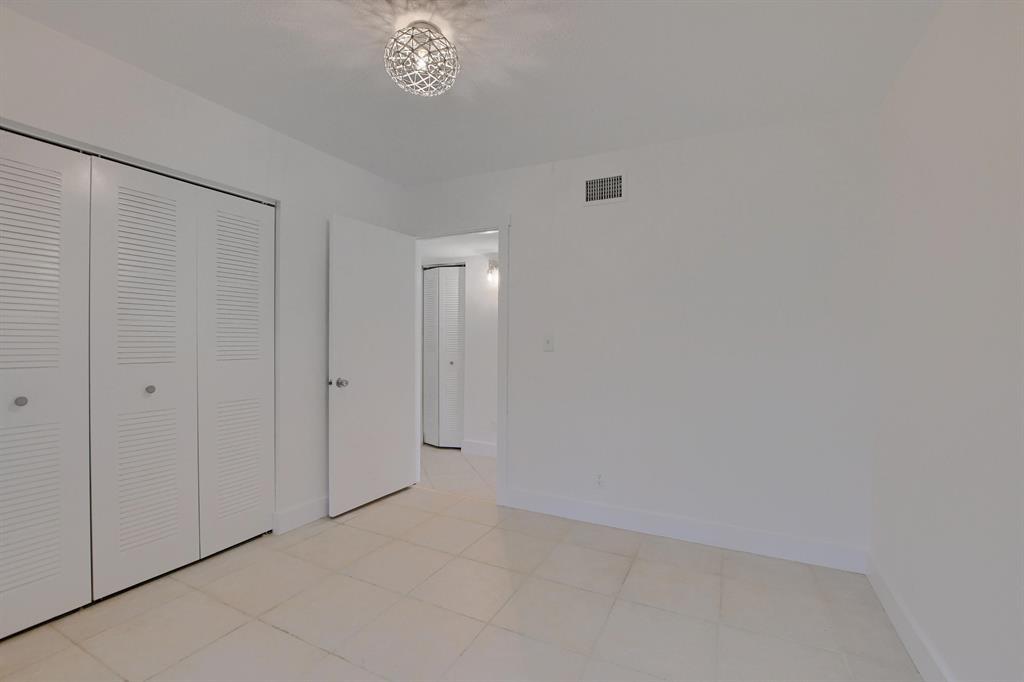 516 Osprey Drive, Unit 14A Delray Beach, FL 33444 - Photo 13 of 20 a view of an empty room