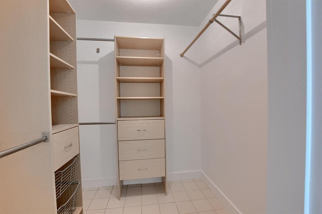 516 Osprey Drive, Unit 14A Delray Beach, FL 33444 - Photo 18 of 20 a view of walk in closet with empty racks