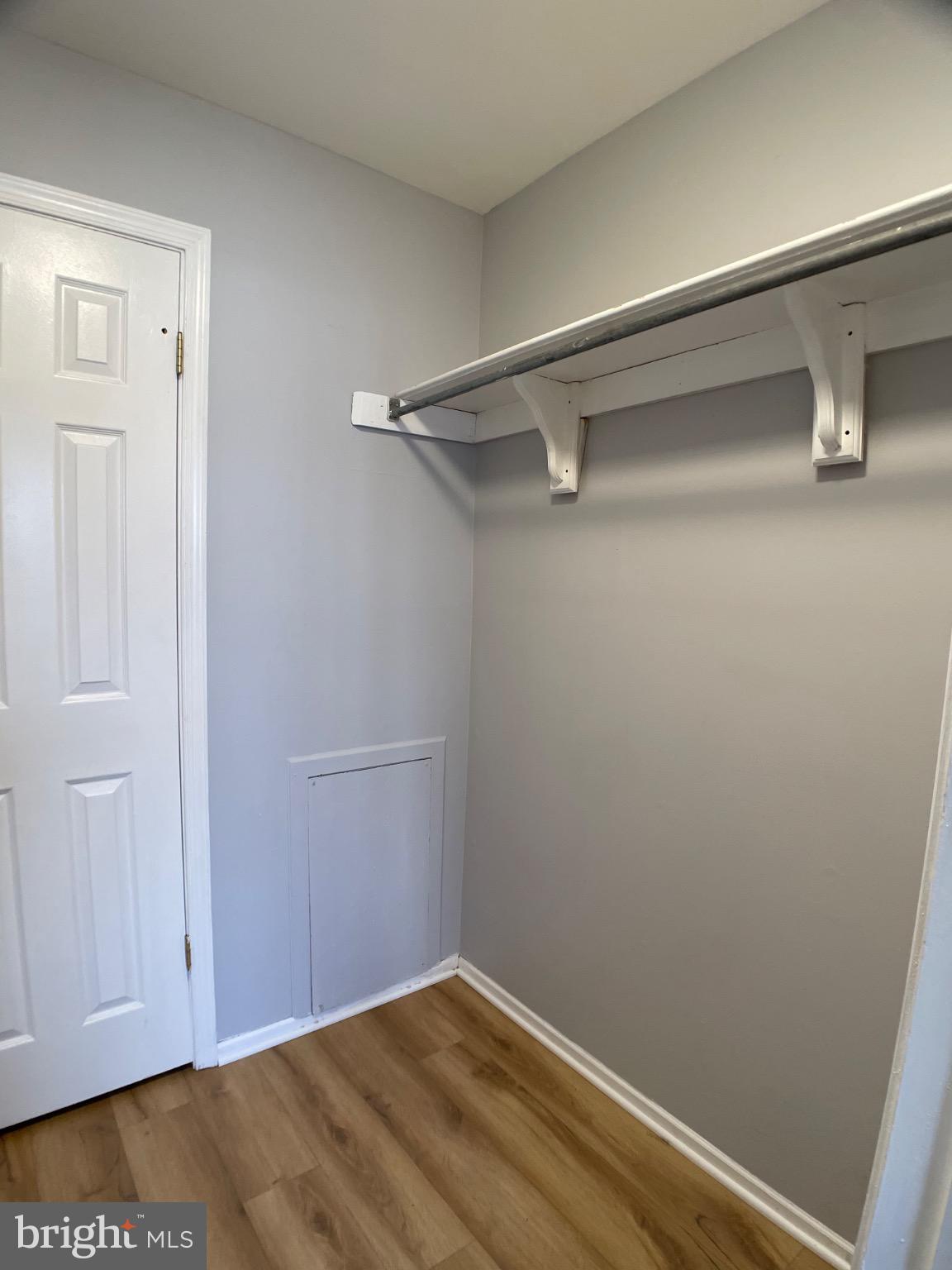 1401 Key Parkway, Unit 204 Frederick, MD 21702 - Photo 12 of 25 a view of a room with racks on the wall