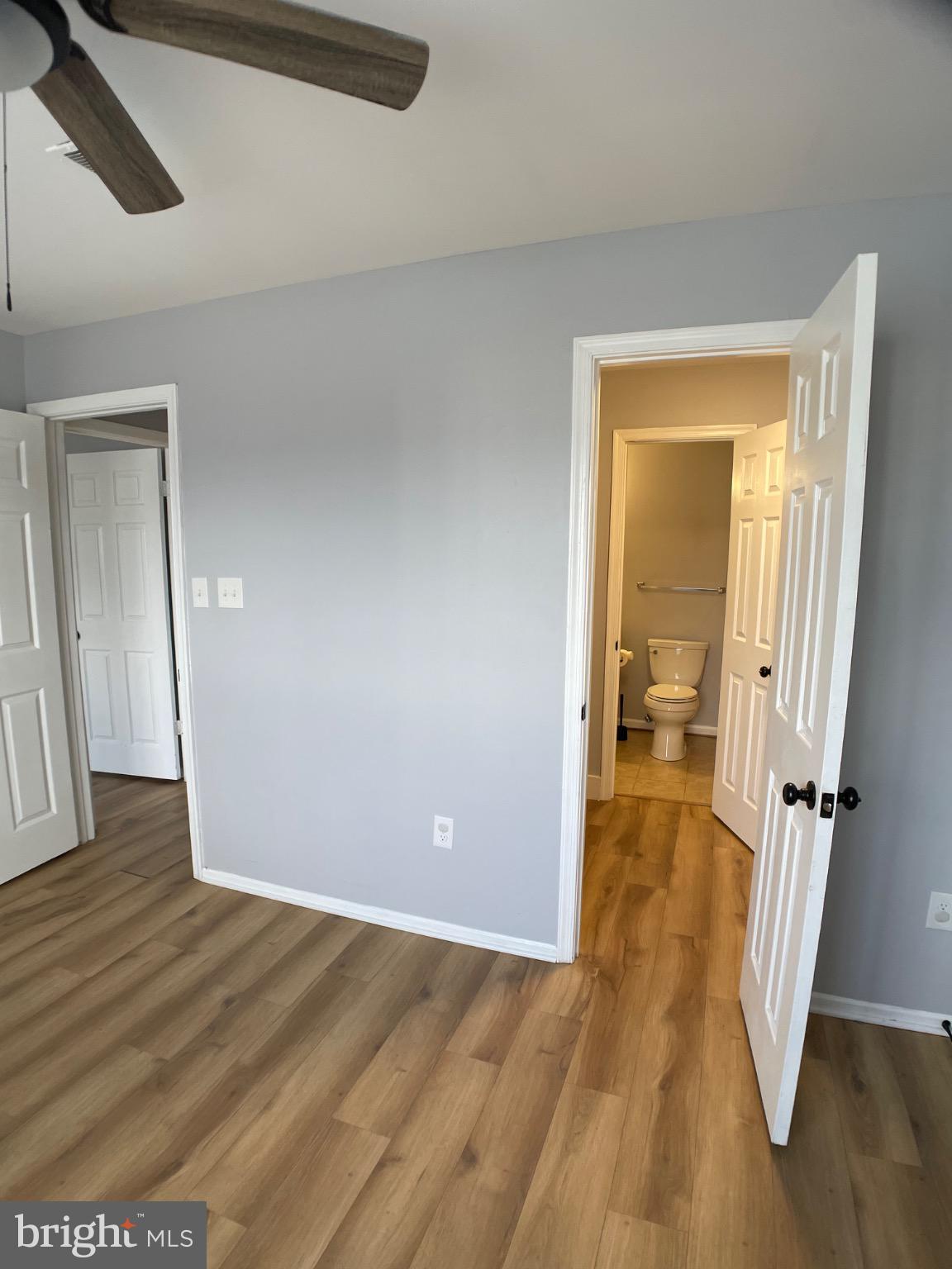 1401 Key Parkway, Unit 204 Frederick, MD 21702 - Photo 13 of 25 wooden floor in an empty room