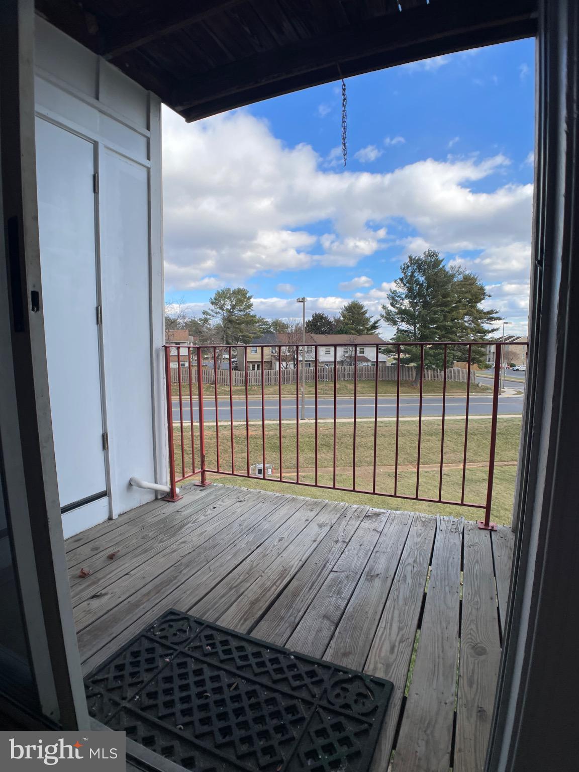 1401 Key Parkway, Unit 204 Frederick, MD 21702 - Photo 14 of 25 a view of balcony with wooden floor