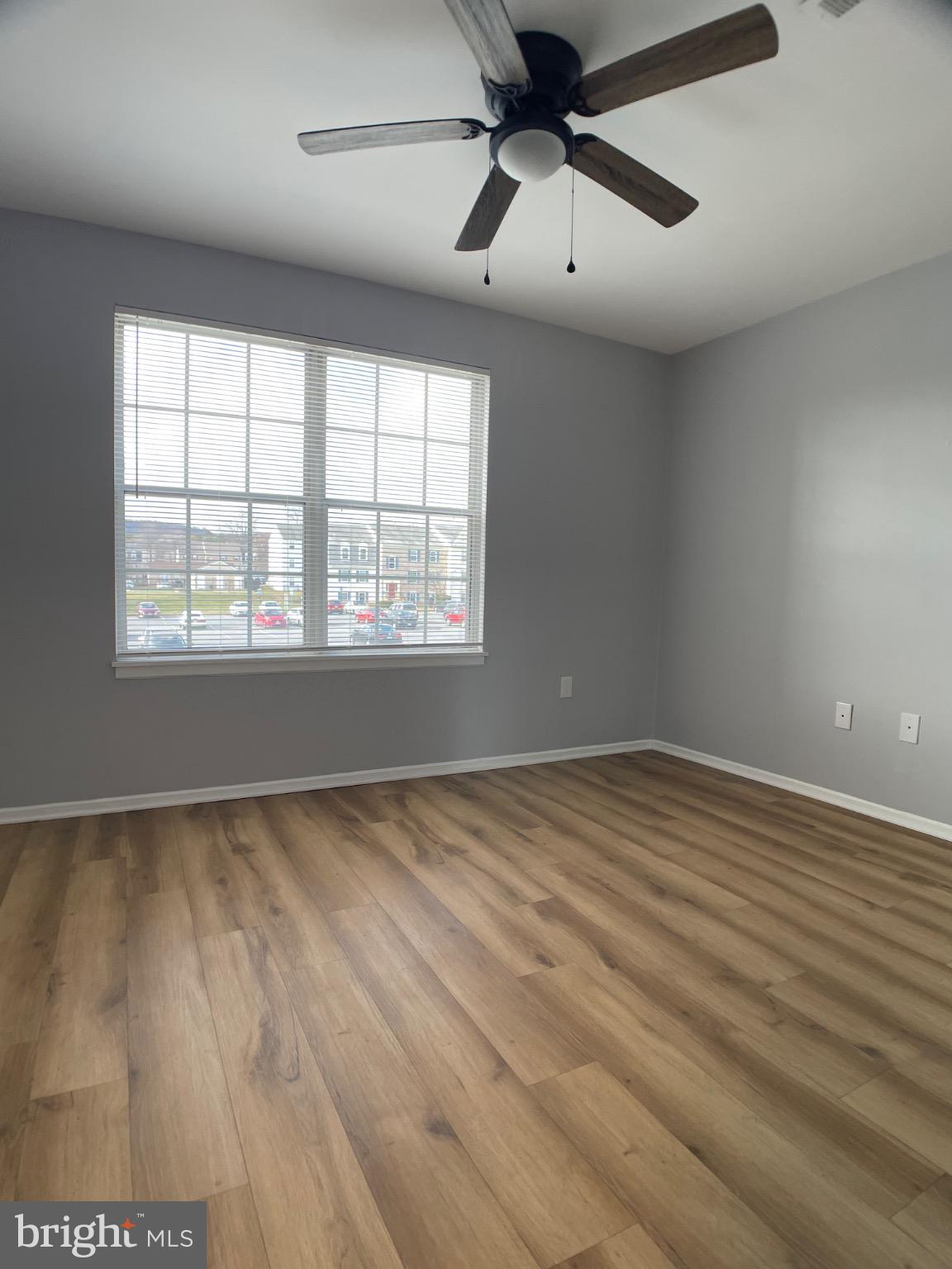 1401 Key Parkway, Unit 204 Frederick, MD 21702 - Photo 18 of 25 a view of an empty room with a window