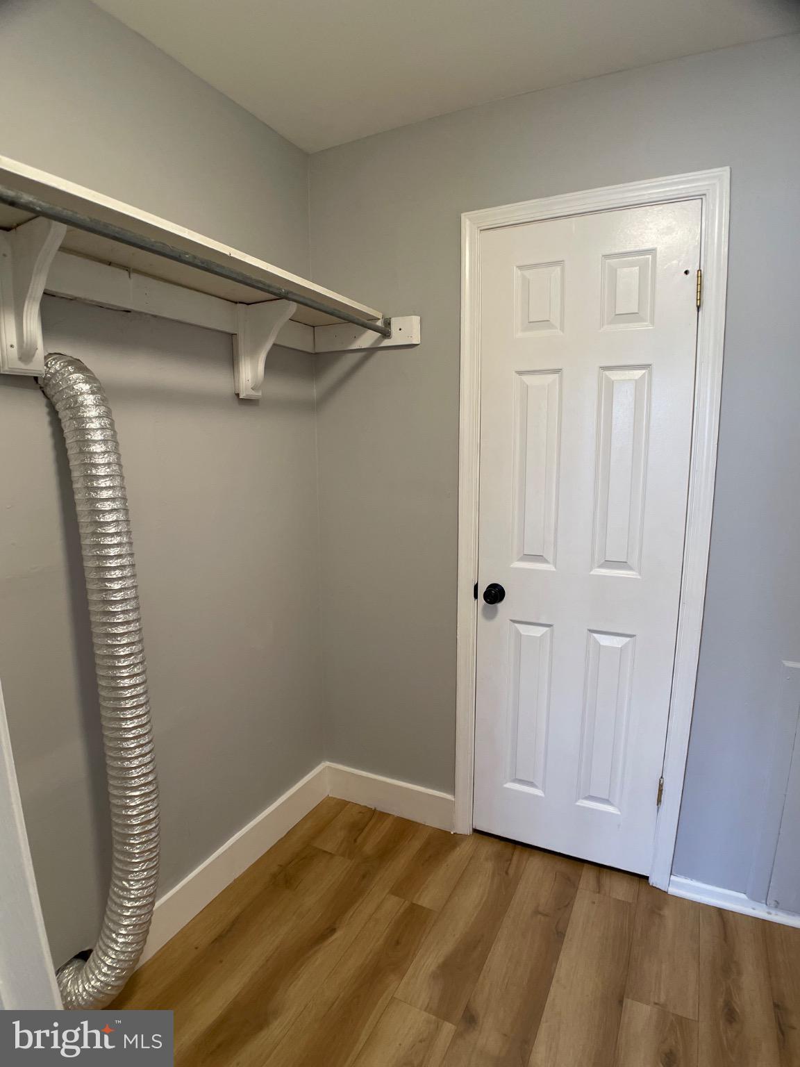 1401 Key Parkway, Unit 204 Frederick, MD 21702 - Photo 25 of 25 a view of empty room with wooden floor