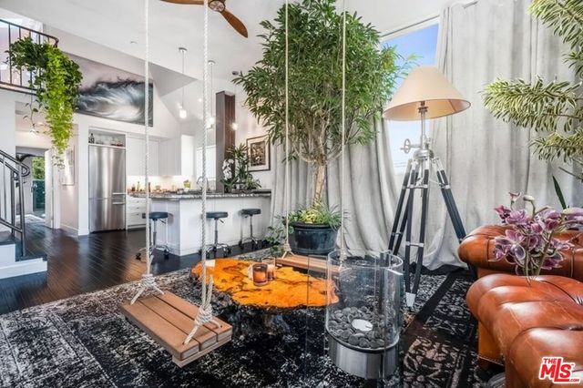 a view of a swimming pool with an outdoor seating