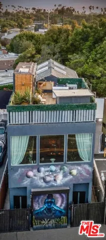 a view of building with yard