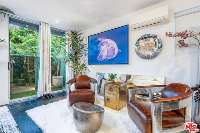 a work place with furniture and a window