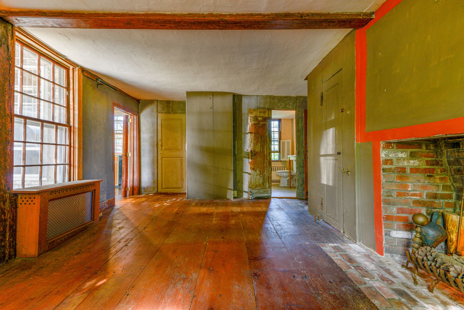 3 Bear Street Nantucket, MA 02554 - Photo 12 of 38 a view of a big room with wooden floor and windows