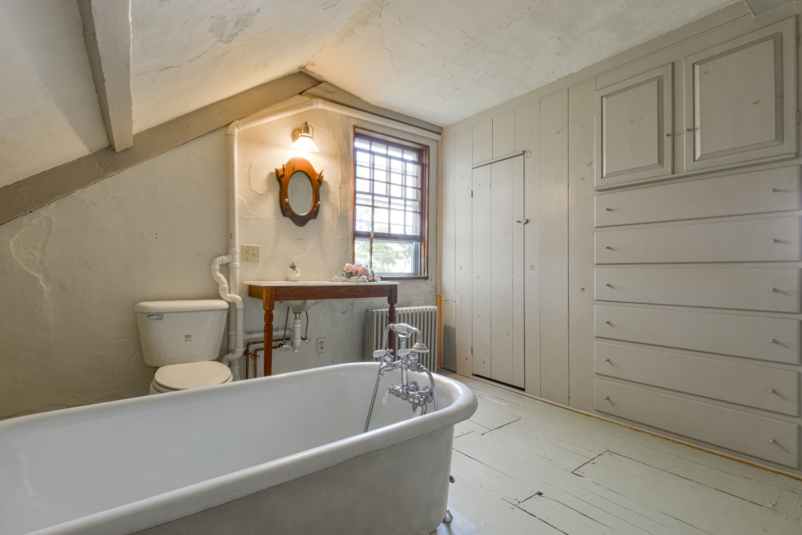 3 Bear Street Nantucket, MA 02554 - Photo 24 of 38 a bathroom with a sink a toilet and tub