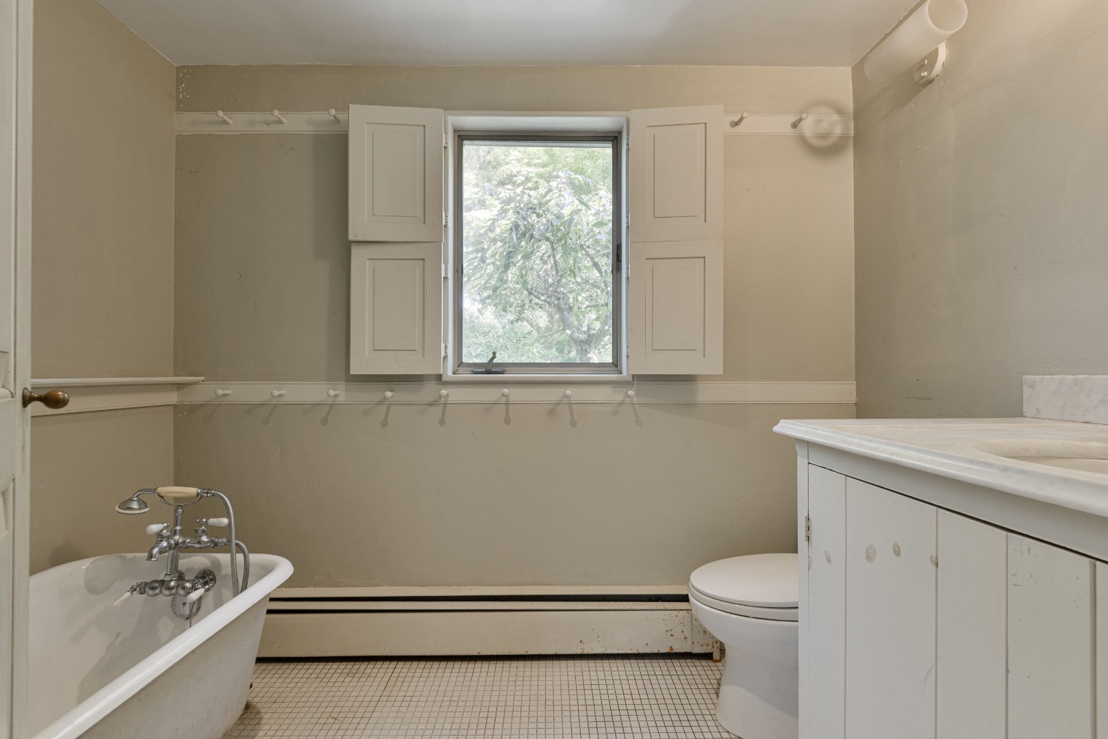3 Bear Street Nantucket, MA 02554 - Photo 29 of 38 a bathroom with a sink a toilet and tub