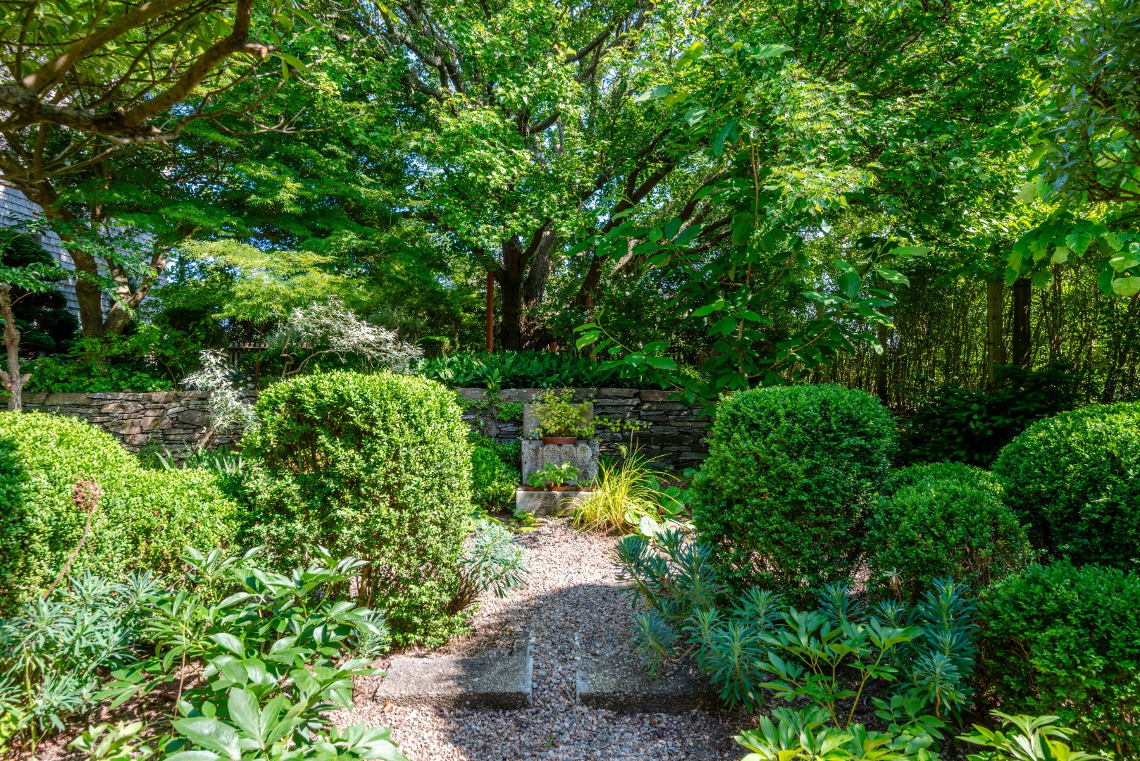 3 Bear Street Nantucket, MA 02554 - Photo 35 of 38 a backyard of a house with lots of green space