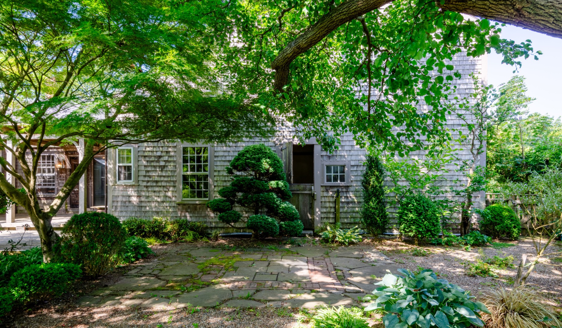 3 Bear Street Nantucket, MA 02554 - Photo 4 of 38 a view of a plants in front of a house