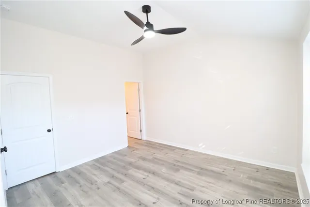 a view of an empty walk in closet