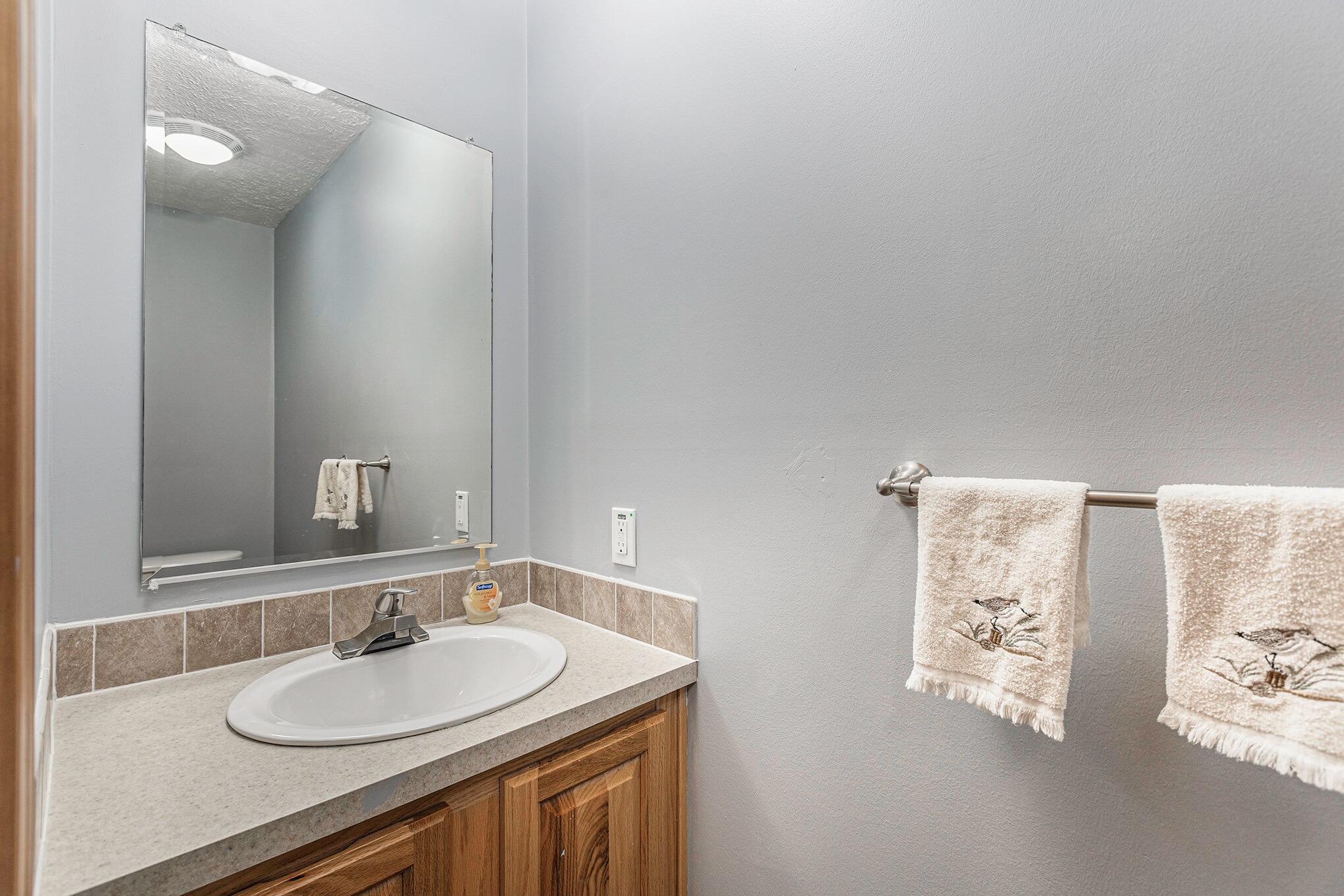 11738 Jewell Road Vanderbilt, MI 49795 - Photo 14 of 45 Half-Bathroom Near Side Entrance